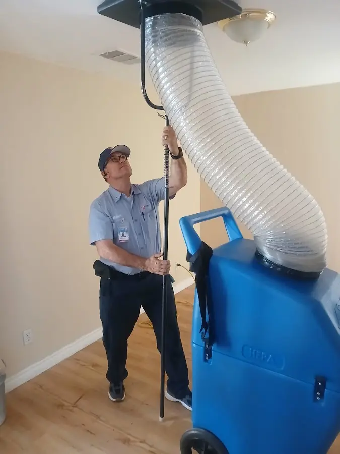 Mini Split Installation technician using HEPA equipment in North Ogden
